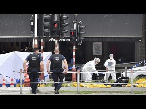 Man kills 3 in Belgium with guns of stabbed police officers