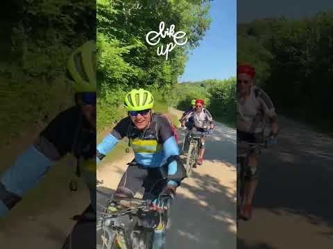 Cyclists in Green Haven: Enchanting Woodland Ride