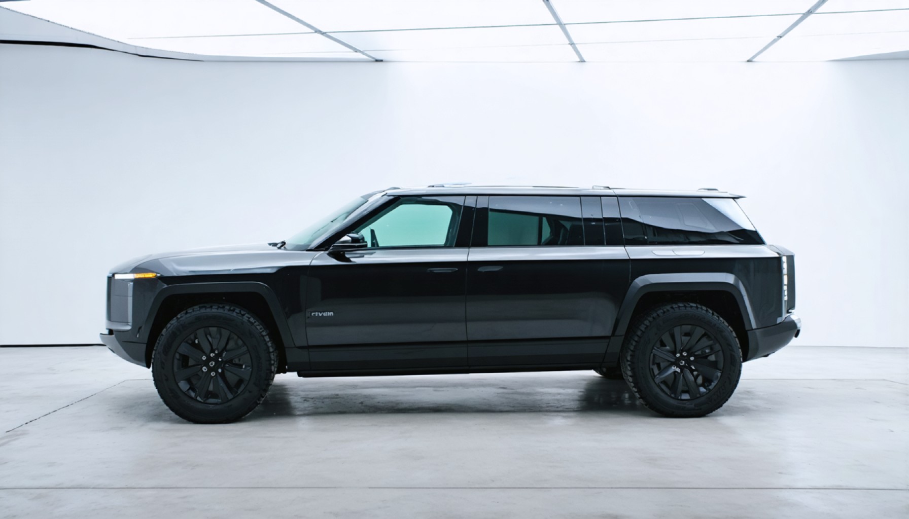 Rivian Rumbles Forward Amid Uncertainty: A $170 Million Profit and a High-Stakes Loan Hangs in the Balance